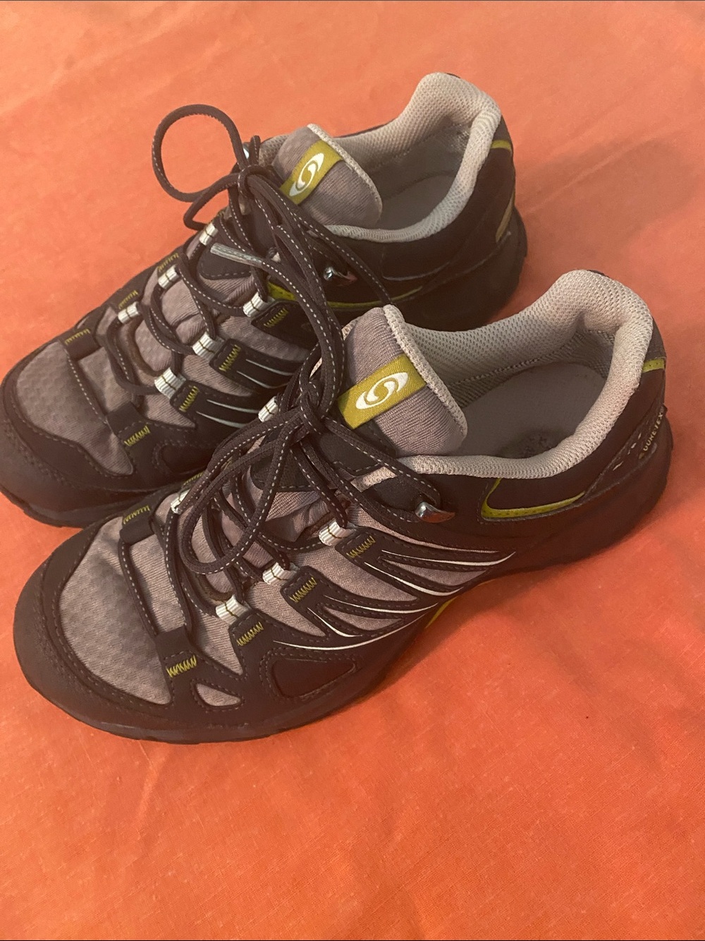Salomon Women’s Gray and Black Athletic Shoes with Yellow Accents
